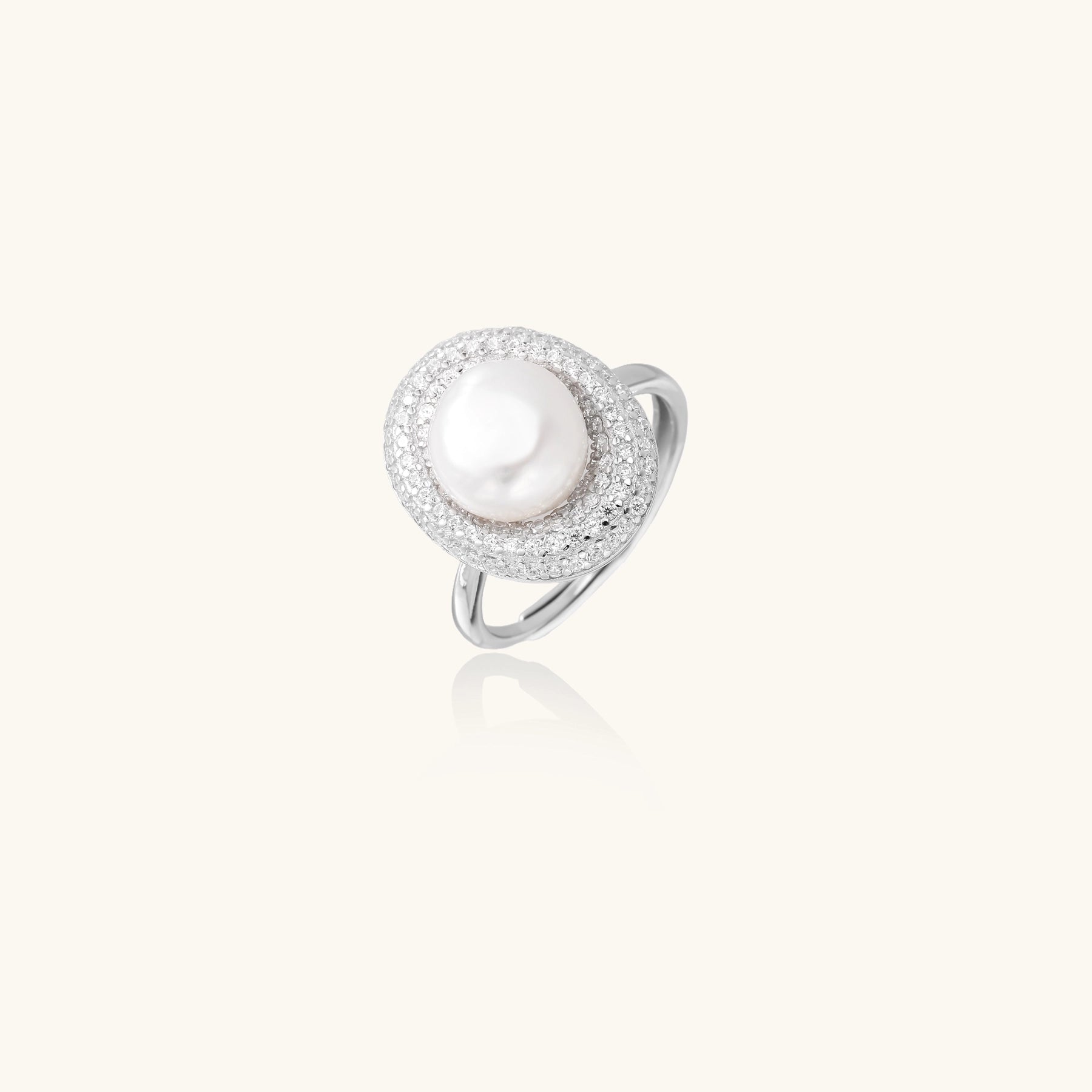 Sterling silver ring with 9mm freshwater pearl center surrounded by double halo of sparkling crystals