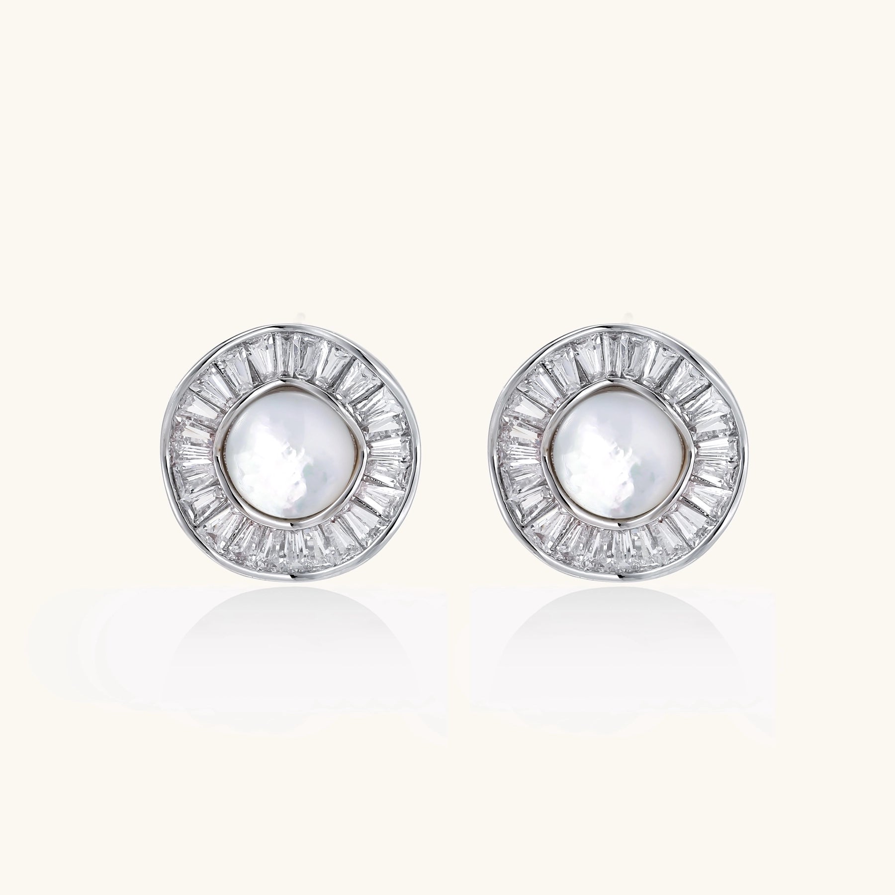 Gold-plated stud earrings with central freshwater pearl surrounded by baguette crystals in radial pattern